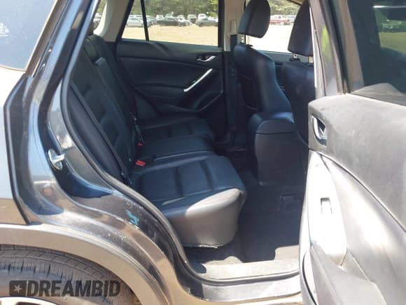 ✅ 2016 Mazda CX-5 Grand Touring • VIN: JM3KE2DYXG0769581 • Lot: 43174558. Listed on IAAI with 206,517 mi. Free auction sales archive from the USA and detailed vehicle history report at DreamBid. Image 8.