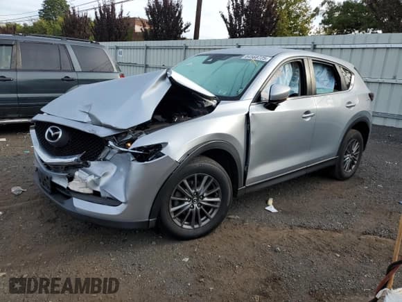 ✅ 2018 Mazda CX-5 Sport • VIN: JM3KFBBM7J0446433 • Лот: 84568725. Опубликован ранее на Copart с пробегом 123 612 миль. Бесплатный доступ к архиву аукционных продаж из США и подробный отчёт об истории автомобиля на DreamBid. Изображение 1.