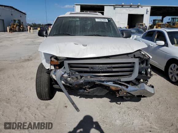 2005 GMC Sierra 1500 Work Truck with VIN 1GTEC14V65Z332388, listed as a Copart auction lot 77437394 with Not provided miles and Non repairable. Bid and sale history available at DreamBid. Image 5.