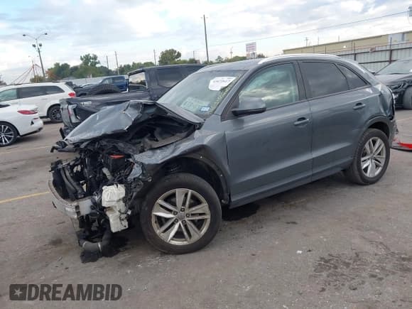 ✅ 2017 Audi Q3 Premium • VIN: WA1BCCFS5HR013516 • Lot: 43472617. Listed on IAAI with 116,823 mi. Free auction sales archive from the USA and detailed vehicle history report at DreamBid. Image 2.