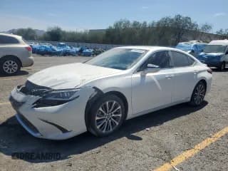 ✅ 2021 Lexus ES 300h • VIN: 58ADA1C15MU001656 • Lot: 71557665. Wystawiony na Copart z przebiegiem 42 327 mil. Bezpłatny archiwum sprzedaży aukcyjnych z USA i szczegółowy raport historii pojazdu na DreamBid. Zdjęcie 1.
