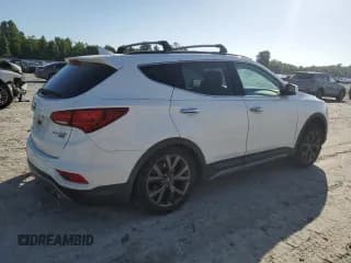 ✅ 2017 Hyundai Santa Fe Ultimate • VIN: 5XYZW4LA8HG396220 • Лот: 59395074. Опубликован ранее на Copart с пробегом 93 090 миль. Бесплатный доступ к архиву аукционных продаж из США и подробный отчёт об истории автомобиля на DreamBid. Изображение 3.