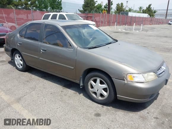 ✅ 1998 Nissan Altima XE • VIN: 1N4DL01D4WC134887 • Lot: 42805612. Listed on IAAI with 238,937 mi. Free auction sales archive from the USA and detailed vehicle history report at DreamBid. Image 1.