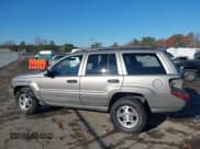 ✅ 1999 Jeep Grand Cherokee Laredo • VIN: 1J4GW58S1XC520727 • Lot: 43730318. Wystawiony na IAAI z przebiegiem 154 356 mil. Bezpłatny archiwum sprzedaży aukcyjnych z USA i szczegółowy raport historii pojazdu na DreamBid. Zdjęcie 14.
