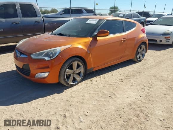 ✅ 2015 Hyundai Veloster • VIN: KMHTC6ADXFU219196 • Lot: 43606291. Listed on IAAI with 130,868 mi. Free auction sales archive from the USA and detailed vehicle history report at DreamBid. Image 2.