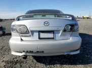 ✅ 2003 Mazda 6 i • VIN: 1YVFP80C835M42881 • Лот: 87475505. Опубликован ранее на Copart с пробегом 217 978 миль. Бесплатный доступ к архиву аукционных продаж из США и подробный отчёт об истории автомобиля на DreamBid. Изображение 6.