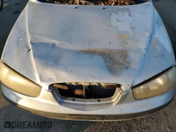 2003 Hyundai Elantra GLS z VIN KMHDN45D73U633397, wystawiony jako Copart lot #79562704 z przebiegiem 127 366 mil mil oraz Czysty tytuł • Clean title. Historia ofert i sprzedaży dostępna na DreamBid. Obrazek 11.