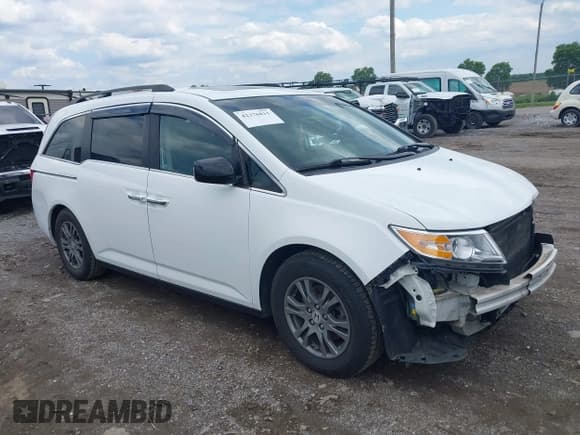 ✅ 2012 Honda Odyssey EX-L • VIN: 5FNRL5H60CB042274 • Lot: 42376811. Listed on IAAI with 169,350 mi. Free auction sales archive from the USA and detailed vehicle history report at DreamBid. Image 1.