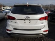 ✅ 2017 Hyundai Santa Fe 2.4L • VIN: 5NMZUDLB9HH014023 • Лот: 43801564. Опубликован ранее на Copart с пробегом 85 633 миль. Бесплатный доступ к архиву аукционных продаж из США и подробный отчёт об истории автомобиля на DreamBid. Изображение 6.