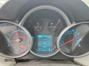 ✅ 2014 Chevrolet Cruze LS • VIN: 1G1PA5SG1E7143825 • Lot: 90257015. Listed on Copart with 171,602 mi. Free auction sales archive from the USA and detailed vehicle history report at DreamBid. Image 9.