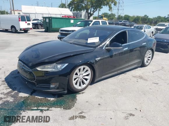 ✅ 2014 Tesla Model S P85D • VIN: 5YJSA1H25EFP65571 • Lot: 42185442. Listed on IAAI with 115,990 mi. Free auction sales archive from the USA and detailed vehicle history report at DreamBid. Image 18.