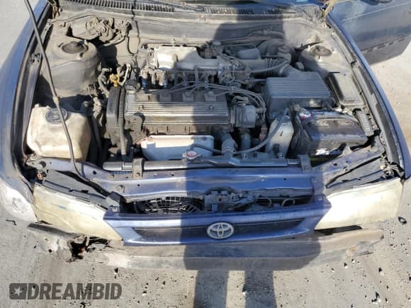 ✅ 1996 Toyota Corolla DX • VIN: 1NXBB02E6TZ363505 • Lot: 72077025. Wystawiony na Copart z przebiegiem 236 432 mil. Bezpłatny archiwum sprzedaży aukcyjnych z USA i szczegółowy raport historii pojazdu na DreamBid. Zdjęcie 11.