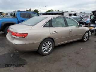 2007 Hyundai Azera SE z VIN KMHFC46F57A227589, wystawiony jako Copart lot #68121904 z przebiegiem 105 724 mil mil oraz Szkoda całkowita • Salvage title. Historia ofert i sprzedaży dostępna na DreamBid. Obrazek 3.
