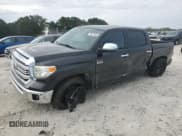 ✅ 2014 Toyota Tundra Platinum • VIN: 5TFAW5F16EX402913 • Lot: 70677095. Listed on Copart with 97,003 mi. Free auction sales archive from the USA and detailed vehicle history report at DreamBid. Image 1.