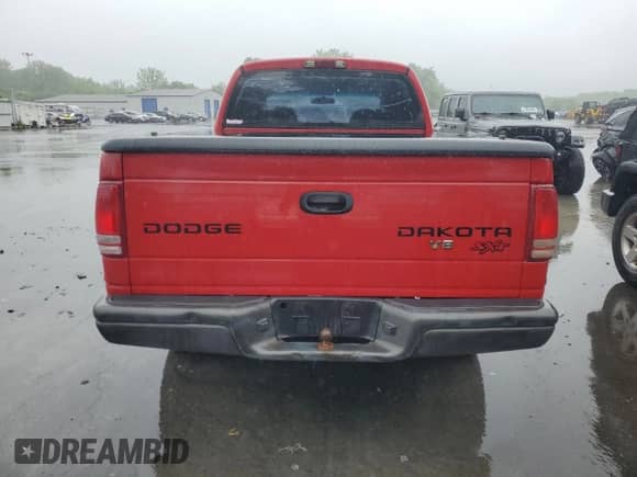 2004 Dodge Dakota Sport с VIN 1D7HG38N14S770790, выставлен на аукционе Copart как лот 55993295 с пробегом 210 458 миль миль и Списание • Salvage title. История ставок и продаж доступна на DreamBid. Изображение 6.