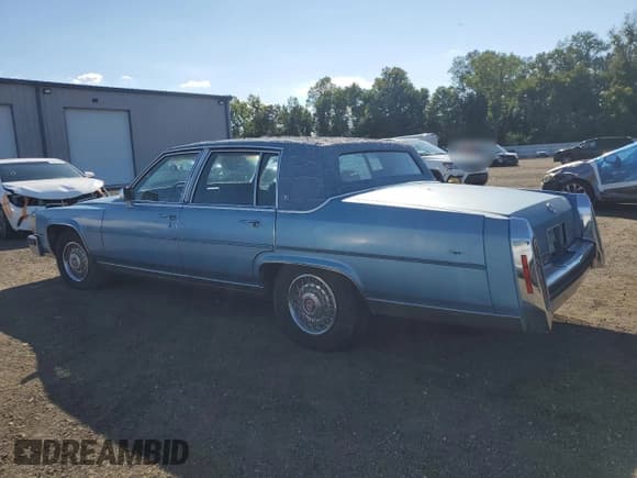 ✅ 1989 Cadillac Brougham • VIN: 1G6DW51Y5KR720073 • Lot: 70095535. Listed on Copart with 85,939 mi. Free auction sales archive from the USA and detailed vehicle history report at DreamBid. Image 2.