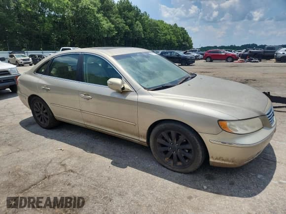 ✅ 2009 Hyundai Azera Limited • VIN: KMHFC46F09A380660 • Lot: 62120475. Listed on Copart with 173,307 mi. Free auction sales archive from the USA and detailed vehicle history report at DreamBid. Image 4.