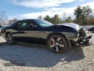 ✅ 2014 Dodge Challenger SXT • VIN: 2C3CDYAG1EH177207 • Lot: 88901135. Wystawiony na Copart z przebiegiem Nie podano. Bezpłatny archiwum sprzedaży aukcyjnych z USA i szczegółowy raport historii pojazdu na DreamBid. Zdjęcie 4.