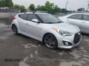 ✅ 2014 Hyundai Veloster Turbo • VIN: KMHTC6AE5EU198135 • Lot: 42236953. Wystawiony na IAAI z przebiegiem 163 139 mil. Bezpłatny archiwum sprzedaży aukcyjnych z USA i szczegółowy raport historii pojazdu na DreamBid. Zdjęcie 1.