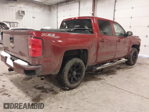 ✅ 2016 Chevrolet Silverado 1500 LT • VIN: 3GCUKREC3GG216871 • Lot: 41418693. Listed on IAAI with 97,074 mi. Free auction sales archive from the USA and detailed vehicle history report at DreamBid. Image 4.