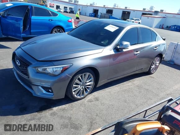 ✅ 2021 Infiniti Q50 Luxe • VIN: JN1EV7BP8MM705608 • Lot: 43530219. Listed on IAAI with 63,043 mi. Free auction sales archive from the USA and detailed vehicle history report at DreamBid. Image 19.