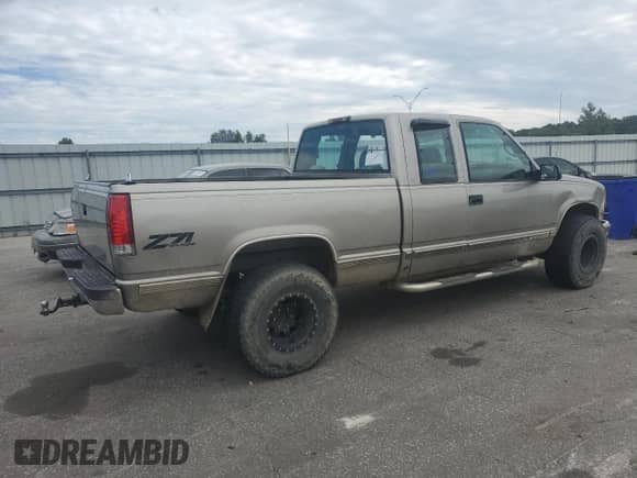 1999 Chevrolet Silverado 1500 с VIN 1GCEK19R4XR118663, выставлен на аукционе Copart как лот 80535195 с пробегом 190 771 миль миль и Списание • Salvage title. История ставок и продаж доступна на DreamBid. Изображение 3.