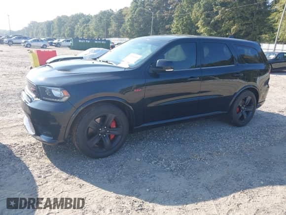 2018 Dodge Durango SRT z VIN 1C4SDJGJ0JC312711, wystawiony jako IAAI lot #43276349 z przebiegiem 155 860 mil mil oraz . Historia ofert i sprzedaży dostępna na DreamBid. Obrazek 2.