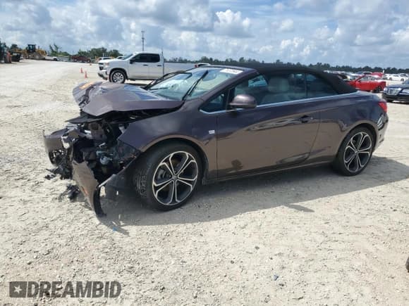 ✅ 2016 Buick Cascada Premium • VIN: W04WT3N59GG155097 • Лот: 71072644. Опубликован ранее на Copart с пробегом Не указан. Бесплатный доступ к архиву аукционных продаж из США и подробный отчёт об истории автомобиля на DreamBid. Изображение 1.