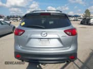 ✅ 2016 Mazda CX-5 Grand Touring • VIN: JM3KE4DY0G0856658 • Lot: 43778076. Wystawiony na IAAI z przebiegiem 103 388 mil. Bezpłatny archiwum sprzedaży aukcyjnych z USA i szczegółowy raport historii pojazdu na DreamBid. Zdjęcie 16.