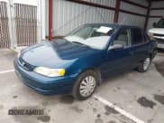 ✅ 1999 Toyota Corolla VE • VIN: 2T1BR12E8XC122098 • Lot: 43863270. Listed on IAAI with 235,905 mi. Free auction sales archive from the USA and detailed vehicle history report at DreamBid. Image 2.