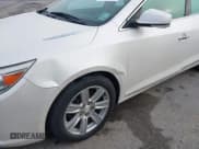 ✅ 2012 Buick LaCrosse Premium 2 • VIN: 1G4GF5E35CF310767 • Lot: 42083067. Listed on IAAI with 143,093 mi. Free auction sales archive from the USA and detailed vehicle history report at DreamBid. Image 6.