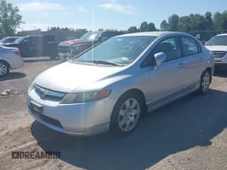 ✅ 2006 Honda Civic LX • VIN: 2HGFA16516H508404 • Lot: 42630879. Wystawiony na IAAI z przebiegiem 157 013 mil. Bezpłatny archiwum sprzedaży aukcyjnych z USA i szczegółowy raport historii pojazdu na DreamBid. Zdjęcie 2.