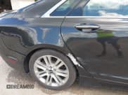 ✅ 2015 Lincoln MKZ • VIN: 3LN6L2G94FR625555 • Lot: 43052508. Listed on IAAI with 103,338 mi. Free auction sales archive from the USA and detailed vehicle history report at DreamBid. Image 18.