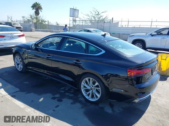 ✅ 2022 Audi A5 Sportback Premium • VIN: WAUABCF58NA006596 • Лот: 41671152. Опубликован ранее на IAAI с пробегом 89 697 миль. Бесплатный доступ к архиву аукционных продаж из США и подробный отчёт об истории автомобиля на DreamBid. Изображение 3.