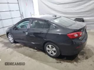 ✅ 2018 Chevrolet Cruze LS • VIN: 1G1BC5SM1J7194102 • Lot: 67433575. Listed on Copart with 157,567 mi. Free auction sales archive from the USA and detailed vehicle history report at DreamBid. Image 2.