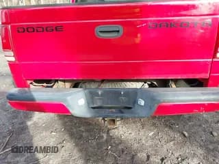 ✅ 2004 Dodge Dakota Sport • VIN: 1D7HG38N64S677103 • Lot: 41665245. Wystawiony na IAAI z przebiegiem 212 470 mil. Bezpłatny archiwum sprzedaży aukcyjnych z USA i szczegółowy raport historii pojazdu na DreamBid. Zdjęcie 6.