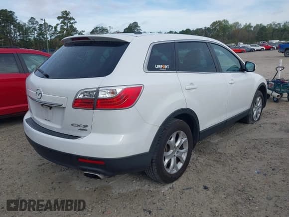 ✅ 2011 Mazda CX-9 Touring • VIN: JM3TB3CV9B0312697 • Lot: 41898844. Listed on IAAI with 188,633 mi. Free auction sales archive from the USA and detailed vehicle history report at DreamBid. Image 4.
