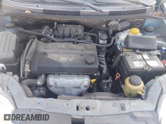 2006 Chevrolet Aveo LT z VIN KL1TG56666B600429, wystawiony jako IAAI lot #43103604 z przebiegiem 83 477 mil mil oraz . Historia ofert i sprzedaży dostępna na DreamBid. Obrazek 10.