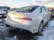 ✅ 2016 Lincoln MKZ • VIN: 3LN6L2J99GR607661 • Lot: 43864420. Wystawiony na IAAI z przebiegiem 159 439 mil. Bezpłatny archiwum sprzedaży aukcyjnych z USA i szczegółowy raport historii pojazdu na DreamBid. Zdjęcie 4.