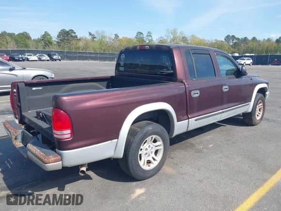 ✅ 2004 Dodge Dakota SLT • VIN: 1D7HL48N74S586018 • Lot: 41910755. Listed on IAAI with 259,924 mi. Free auction sales archive from the USA and detailed vehicle history report at DreamBid. Image 4.