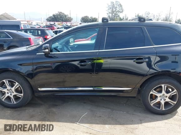 ✅ 2014 Volvo XC60 R-Design Premier Plus • VIN: YV4902DZ4E2554890 • Lot: 41599418. Wystawiony na IAAI z przebiegiem 90 090 mil. Bezpłatny archiwum sprzedaży aukcyjnych z USA i szczegółowy raport historii pojazdu na DreamBid. Zdjęcie 14.