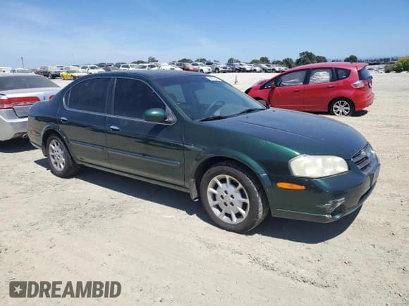 ✅ 2001 Nissan Maxima GXE • VIN: JN1CA31D41T606921 • Лот: 66935545. Опубликован ранее на Copart с пробегом 231 390 миль. Бесплатный доступ к архиву аукционных продаж из США и подробный отчёт об истории автомобиля на DreamBid. Изображение 4.