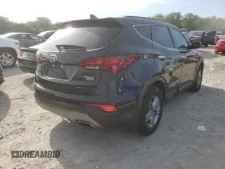 ✅ 2018 Hyundai Santa Fe 2.4L • VIN: 5NMZUDLB1JH063089 • Лот: 57906162. Опубликован ранее на Copart с пробегом 83 722 миль. Бесплатный доступ к архиву аукционных продаж из США и подробный отчёт об истории автомобиля на DreamBid. Изображение 4.