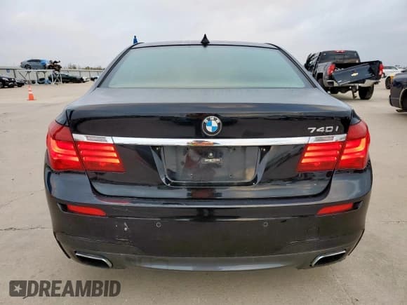 ✅ 2014 BMW 7 Series 740i • VIN: WBAYA6C5XED144517 • Lot: 90255015. Wystawiony na Copart z przebiegiem 178 636 mil. Bezpłatny archiwum sprzedaży aukcyjnych z USA i szczegółowy raport historii pojazdu na DreamBid. Zdjęcie 6.