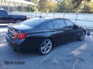 ✅ 2014 BMW 7 Series ALPINA B7 • VIN: WBAYE8C58ED136139 • Lot: 91629365. Listed on Copart with 146,223 mi. Free auction sales archive from the USA and detailed vehicle history report at DreamBid. Image 3.