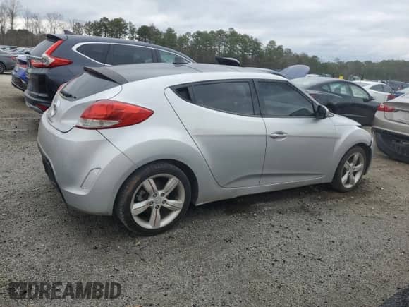 2012 Hyundai Veloster w/Red Int z VIN KMHTC6AD2CU021143, wystawiony jako Copart lot #44055345 z przebiegiem Nie podano mil oraz Czysty tytuł • Clean title. Historia ofert i sprzedaży dostępna na DreamBid. Obrazek 3.