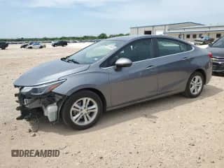 2018 Chevrolet Cruze LT с VIN 1G1BH5SE7J7205100, выставлен на аукционе Copart как лот 56786335 с пробегом 80 573 миль миль и Списание • Salvage title. История ставок и продаж доступна на DreamBid. Изображение 1.
