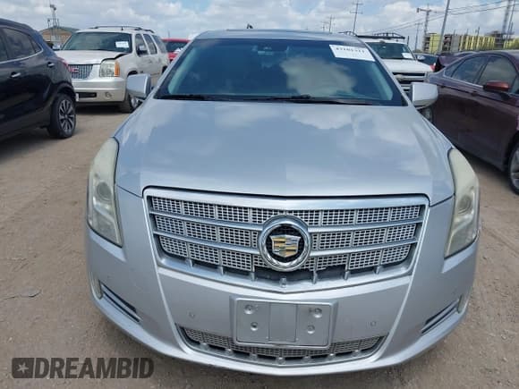 ✅ 2013 Cadillac XTS Platinum • VIN: 2G61U5S3XD9216059 • Lot: 43101311. Listed on IAAI with 161,082 mi. Free auction sales archive from the USA and detailed vehicle history report at DreamBid. Image 12.