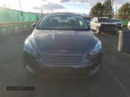 ✅ 2018 Ford Focus Titanium • VIN: 1FADP3J20JL216872 • Lot: 93197025. Wystawiony na Copart z przebiegiem 30 726 mil. Bezpłatny archiwum sprzedaży aukcyjnych z USA i szczegółowy raport historii pojazdu na DreamBid. Zdjęcie 5.