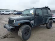 ✅ 2008 Jeep Wrangler Unlimited X • VIN: 1J4GA39138L641138 • Lot: 41986230. Listed on IAAI with 215,026 mi. Free auction sales archive from the USA and detailed vehicle history report at DreamBid. Image 2.